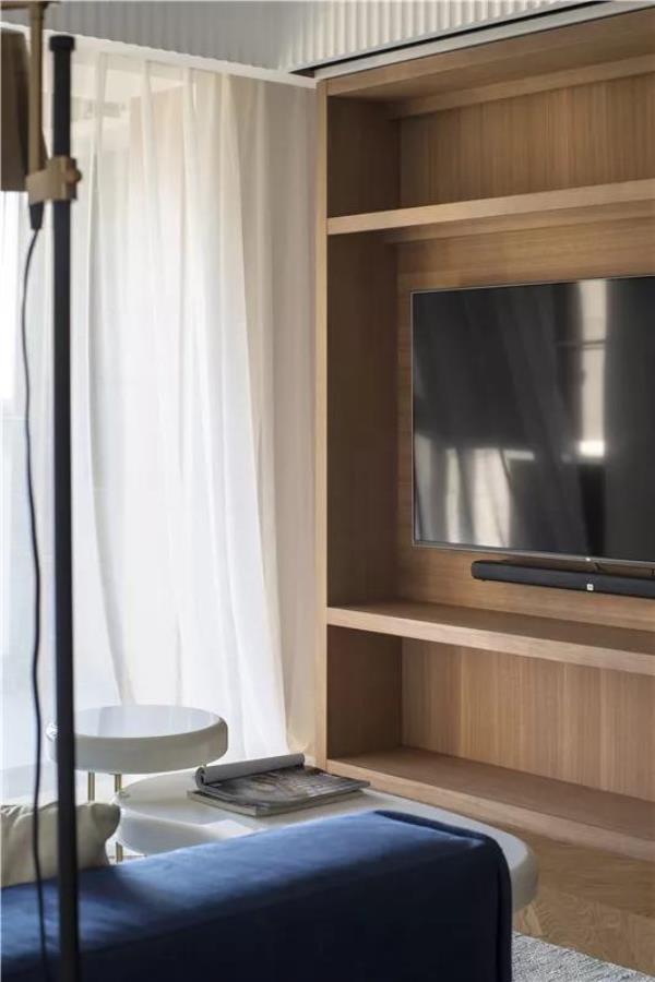南宁家装公司：80㎡北欧三居室装修，定制的电视柜+书架格！
